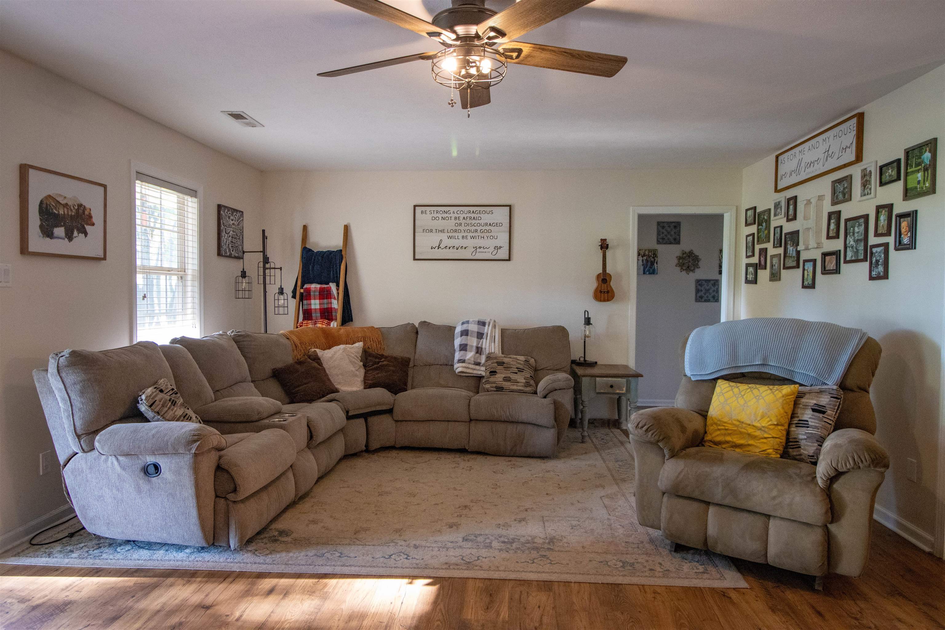120 Craig Road Ripley, TN 38063 - Photo 6 of 38 Spacious Great Room featuring wood-finish flooring and a ceiling fan with integrated lighting