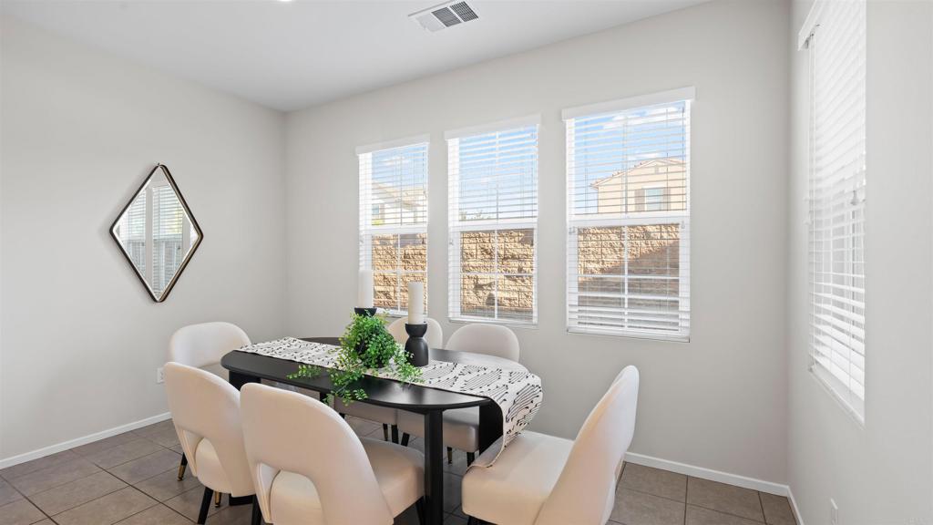 21578 Saddle Bred Lane Escondido, CA 92029 - Photo 13 of 49 a view of a dining room with furniture window and outside view