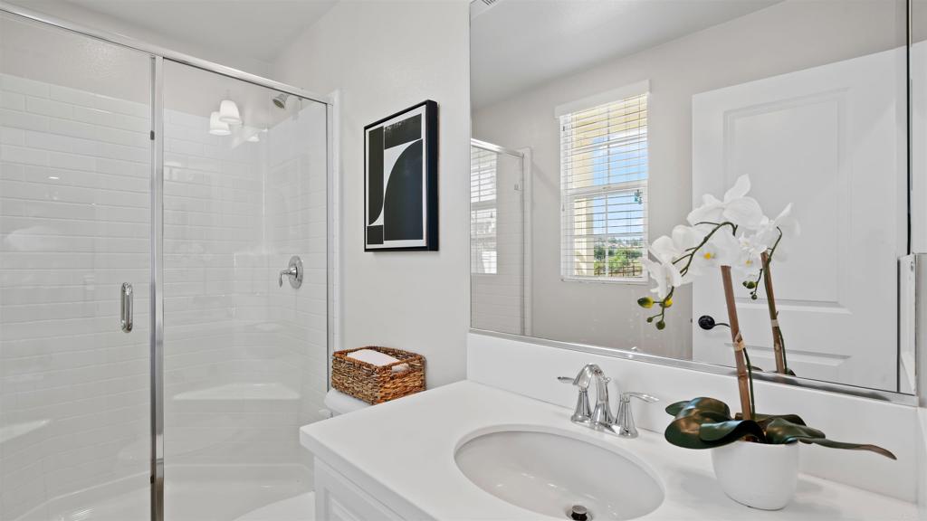 21578 Saddle Bred Lane Escondido, CA 92029 - Photo 16 of 49 a bathroom with a sink and a mirror