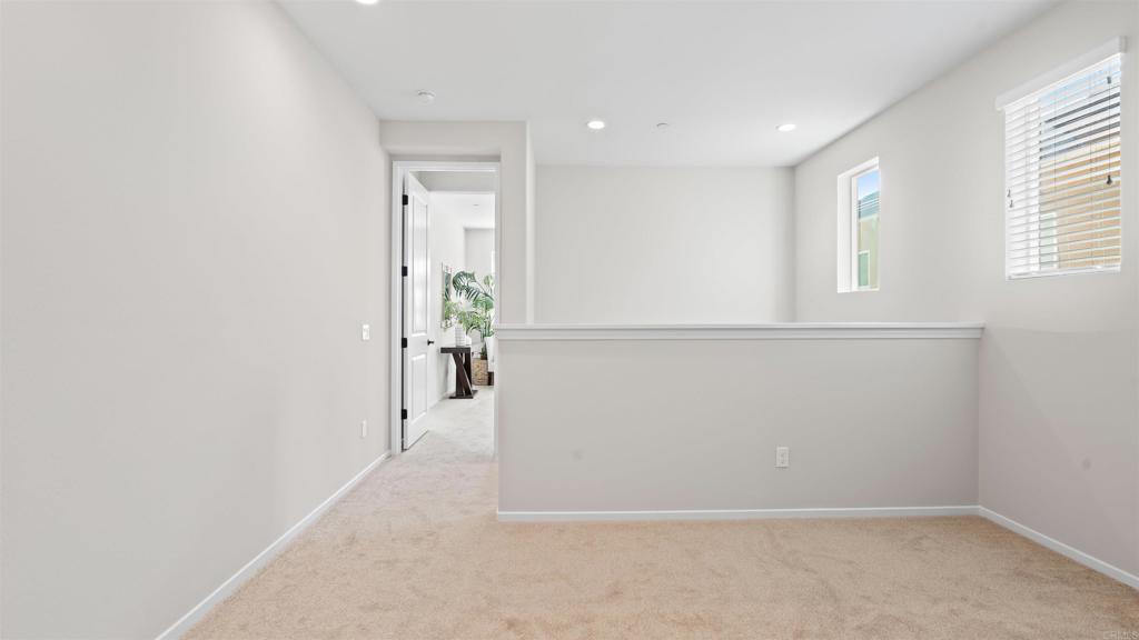 21578 Saddle Bred Lane Escondido, CA 92029 - Photo 19 of 49 an empty room with windows