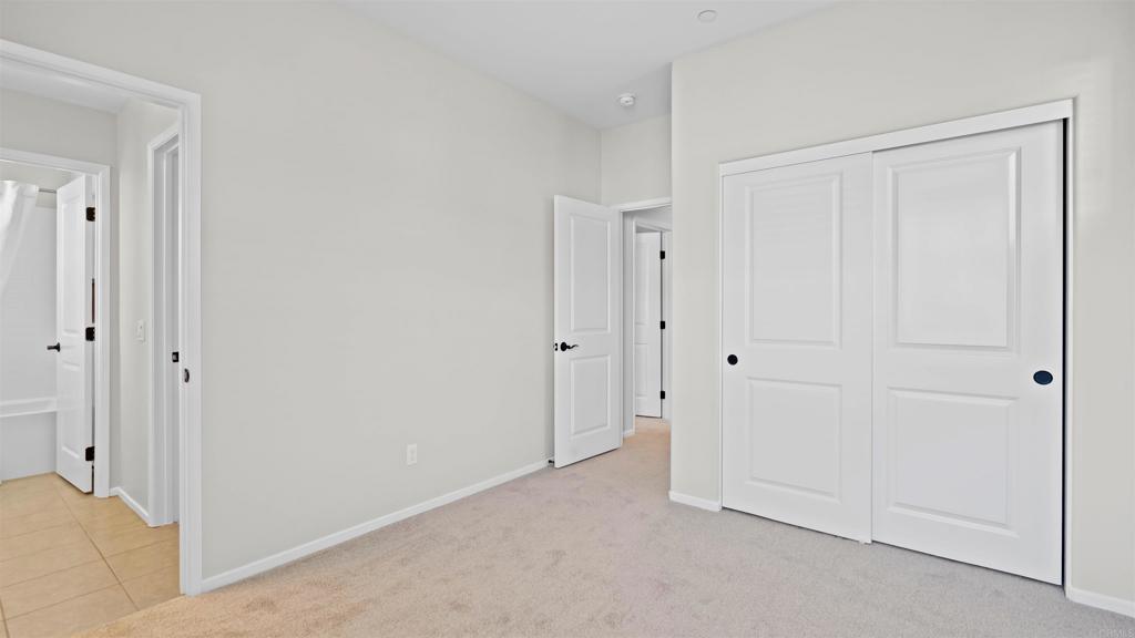 21578 Saddle Bred Lane Escondido, CA 92029 - Photo 33 of 49 a view of a livingroom and an empty room