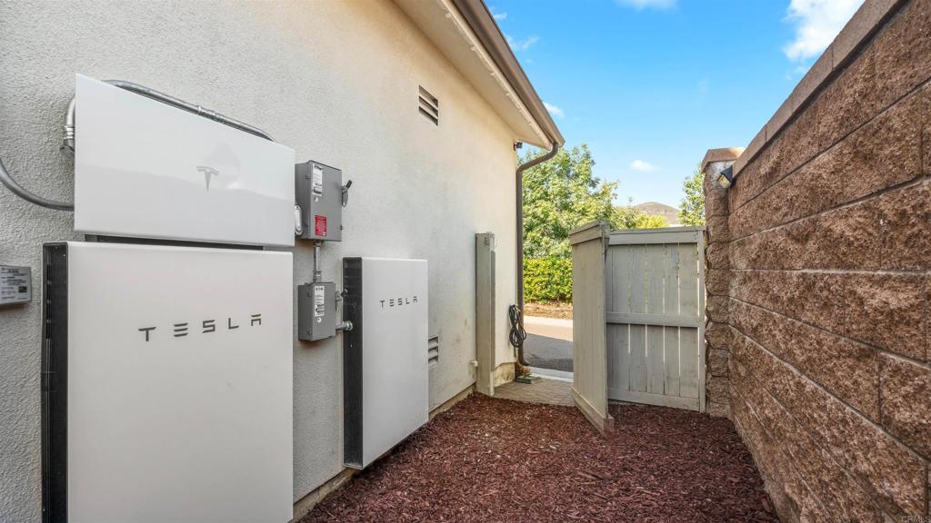 21578 Saddle Bred Lane Escondido, CA 92029 - Photo 40 of 49 a view of a storage & utility room with washer and dryer