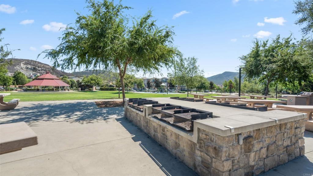 21578 Saddle Bred Lane Escondido, CA 92029 - Photo 46 of 49 a view of a house with swimming pool and a yard