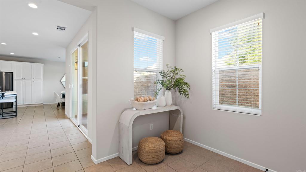 21578 Saddle Bred Lane Escondido, CA 92029 - Photo 6 of 49 a room with furniture and a potted plant