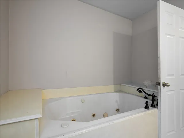 a bathroom with a bathtub