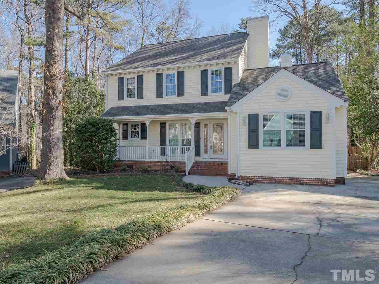 1437 Greenside Drive Raleigh, NC 27609 - Photo 2 of 16 Ample room for 2 cars on the parking pad in front of the house.