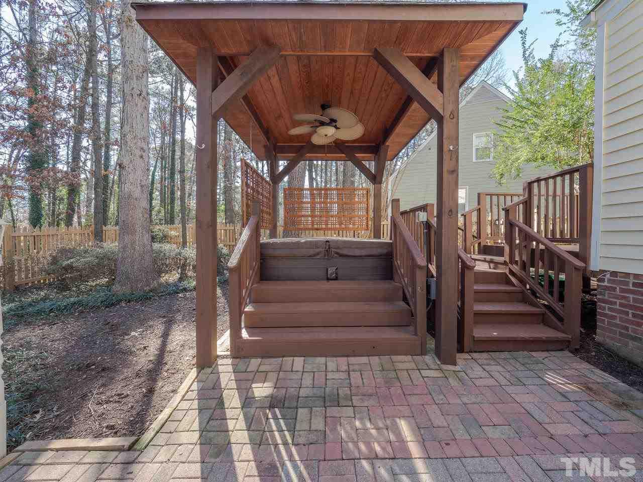 1437 Greenside Drive Raleigh, NC 27609 - Photo 14 of 16 Your private hot tub under a gazebo provides a perfect way to relax!