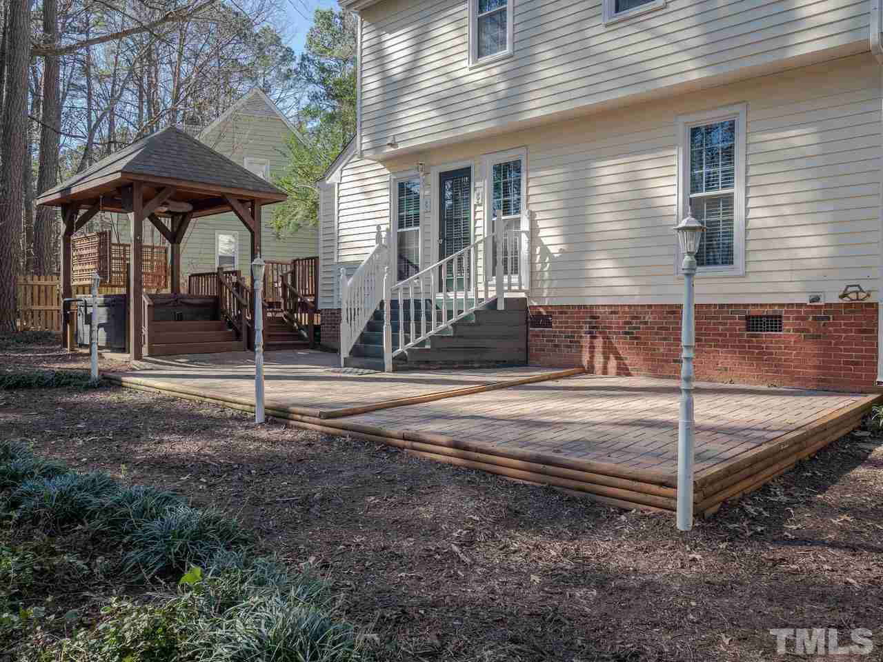 1437 Greenside Drive Raleigh, NC 27609 - Photo 16 of 16 You evenings will be more enjoyable outside on the patio with the lights providing a bit of illumination.