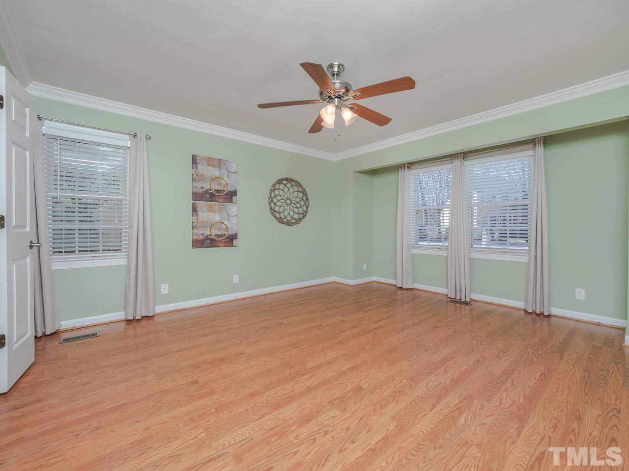 1437 Greenside Drive Raleigh, NC 27609 - Photo 7 of 16 Downstairs Master bedroom with full bath. Direct access to the hot tub and patio from the back door!