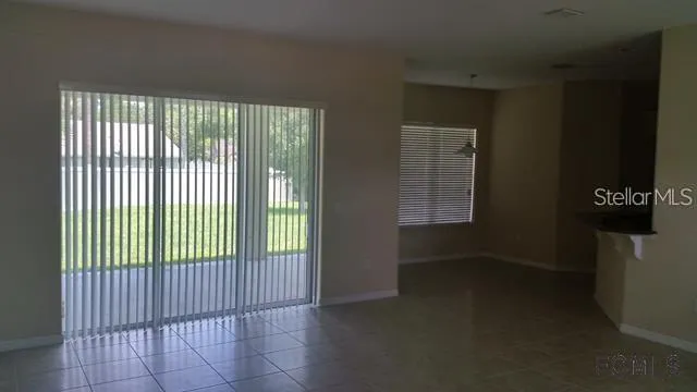 a view of a room that has a window in it