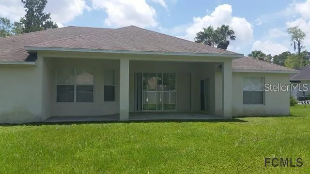a view of a house with garden