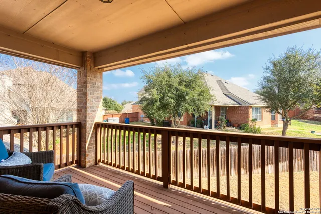 a view of balcony with furniture