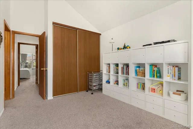 a bedroom with a bed and furniture