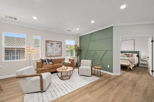 a living room with furniture and a window