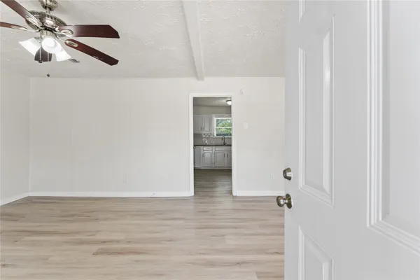 a view of room with hardwood floor