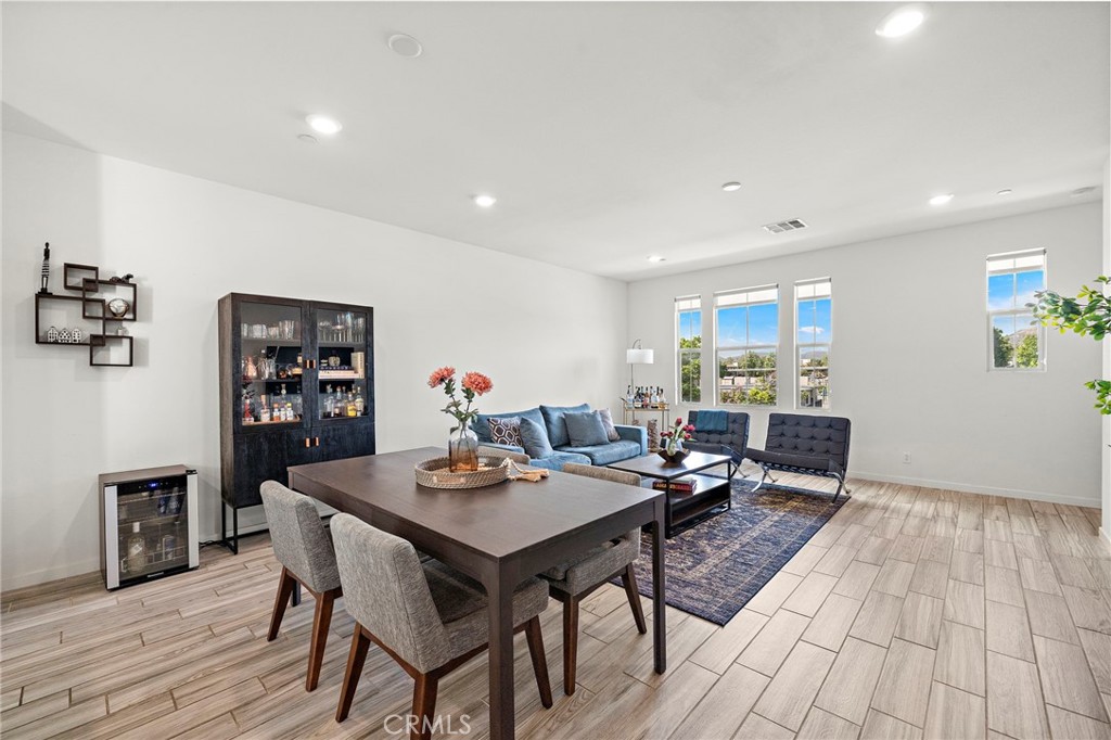 144 Paramount Irvine, CA 92618 - Photo 12 of 43 a view of a dining room with furniture