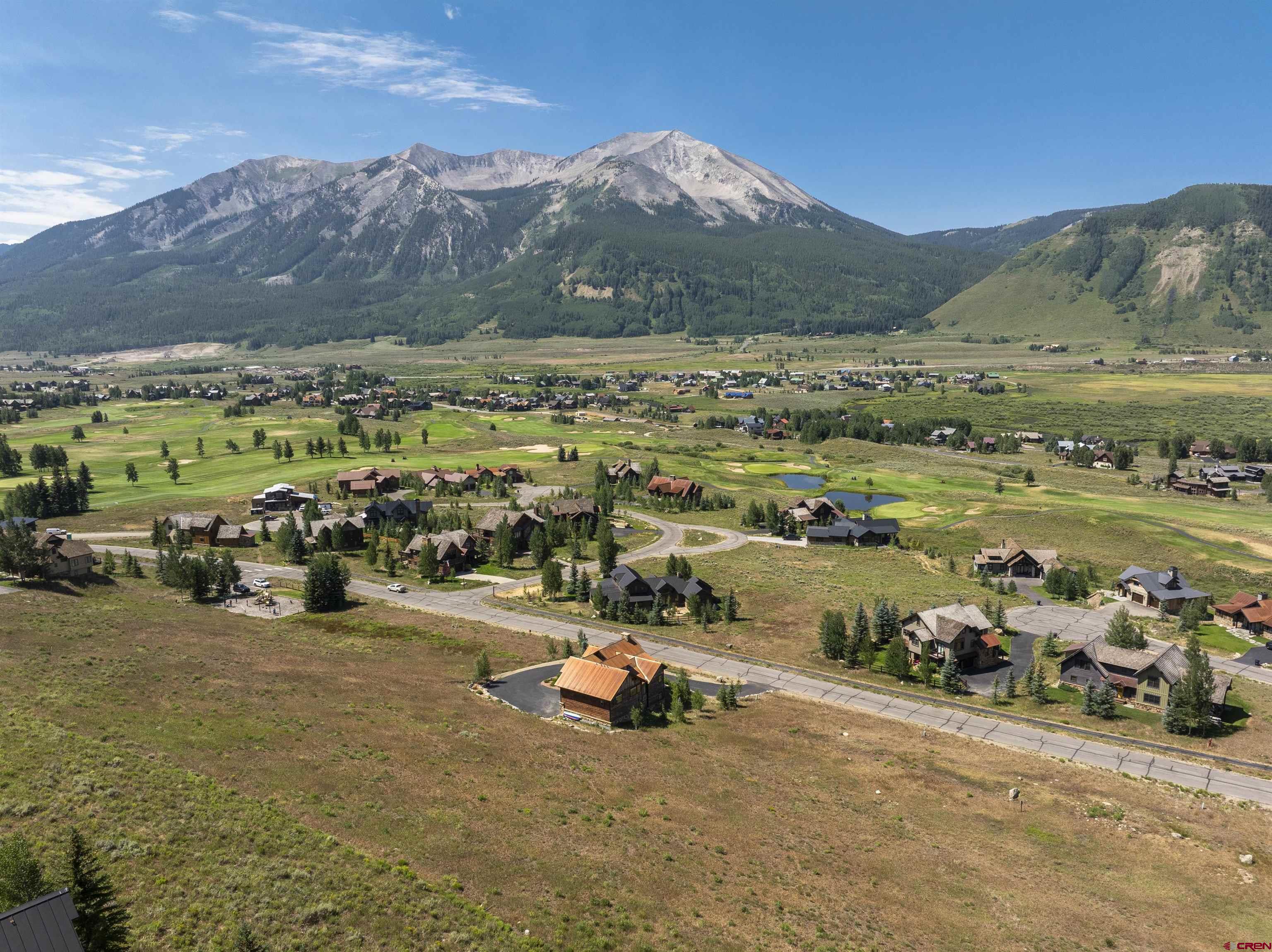 a view of a lake with a mountain