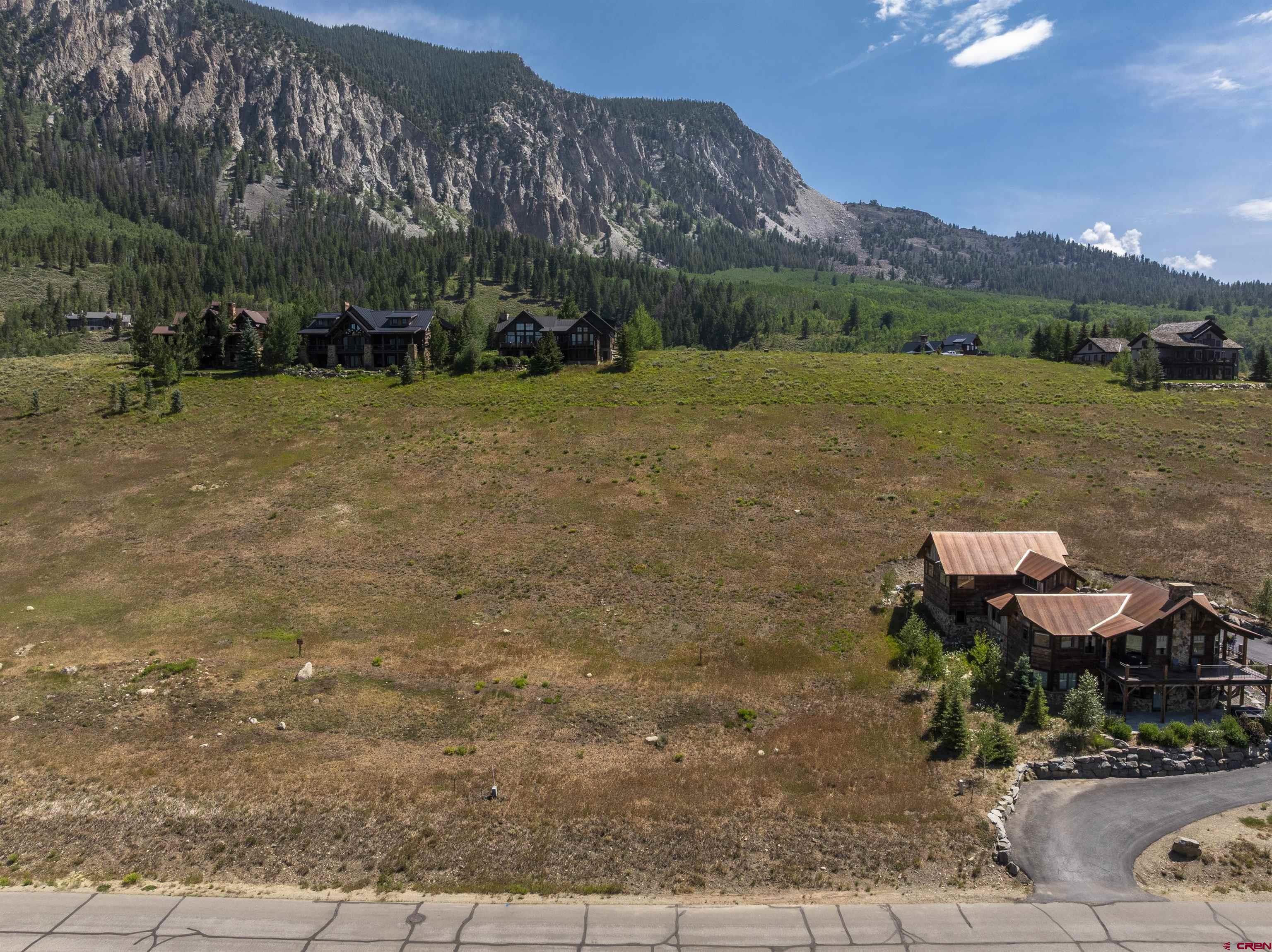 434 Country Club Drive Crested Butte, CO 81224 - Photo 19 of 24 a view of a lake with a mountain