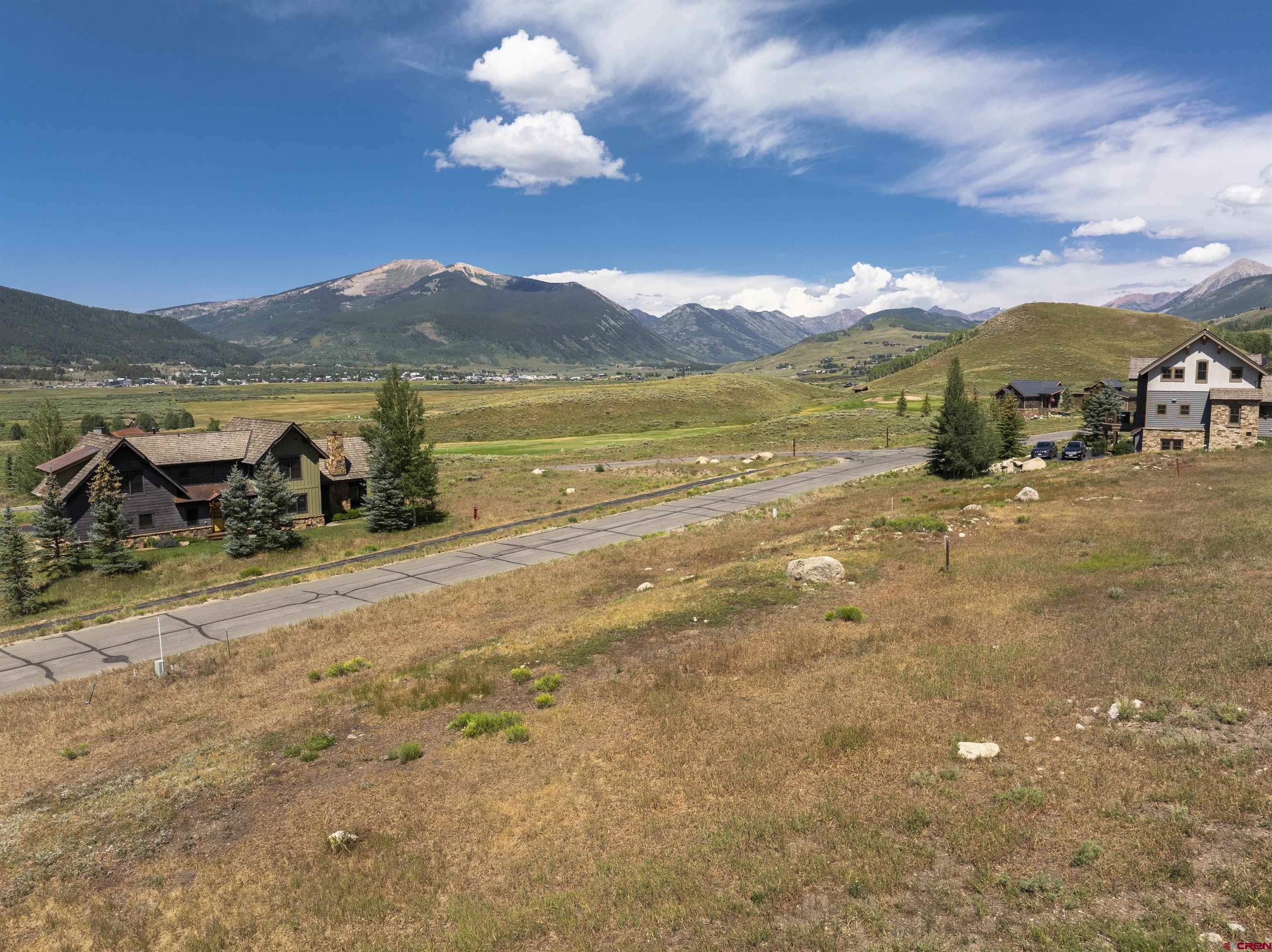 434 Country Club Drive Crested Butte, CO 81224 - Photo 21 of 24 a view of a lake with a mountain