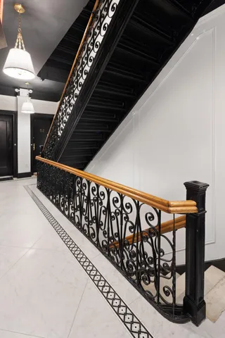 a black and white building with glass windows