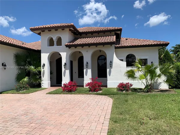 a front view of house with yard