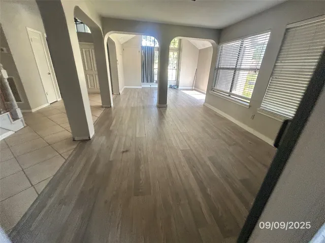 a view of entryway with wooden floor