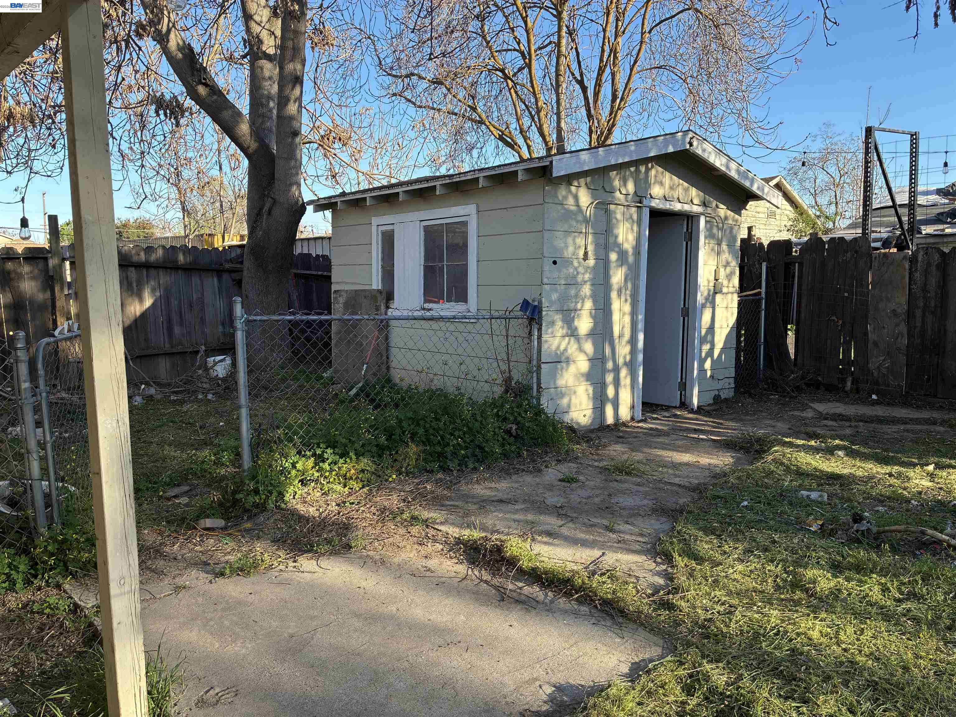1614 Mono Drive Modesto, CA 95354 - Photo 13 of 15 a front view of a house with a yard
