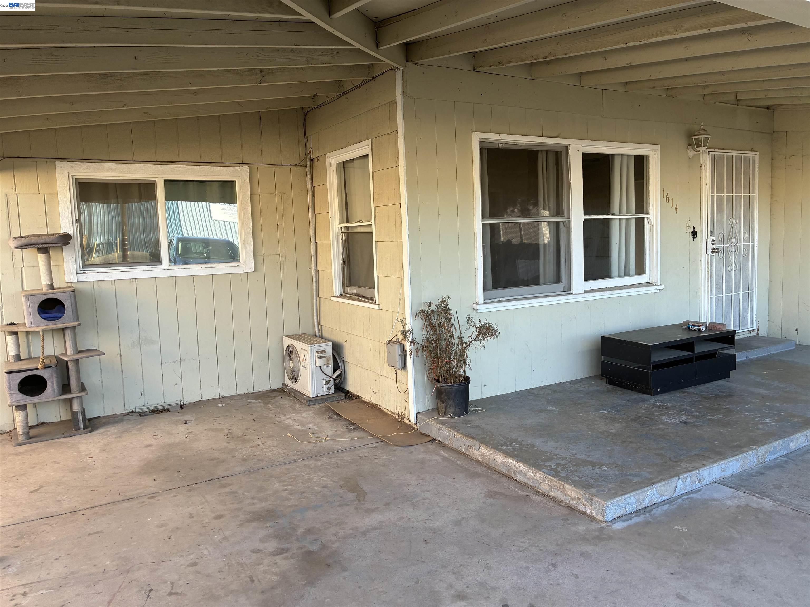 1614 Mono Drive Modesto, CA 95354 - Photo 2 of 15 a view of an empty room with a window