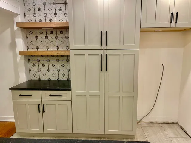 a view of a plants with trees in the background