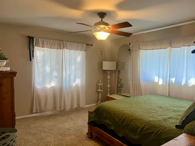 a bathroom with a shower and a sink