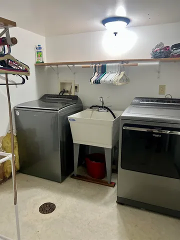 a bed room with a bed and a book shelf