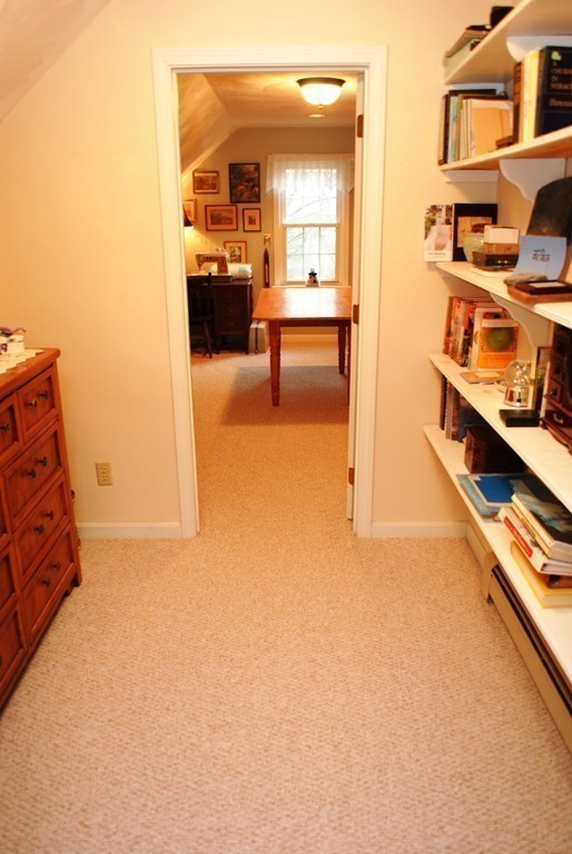 61 Blanchard Road Boxborough, MA 01719 - Photo 15 of 27 view of living room with furniture and a book shelf