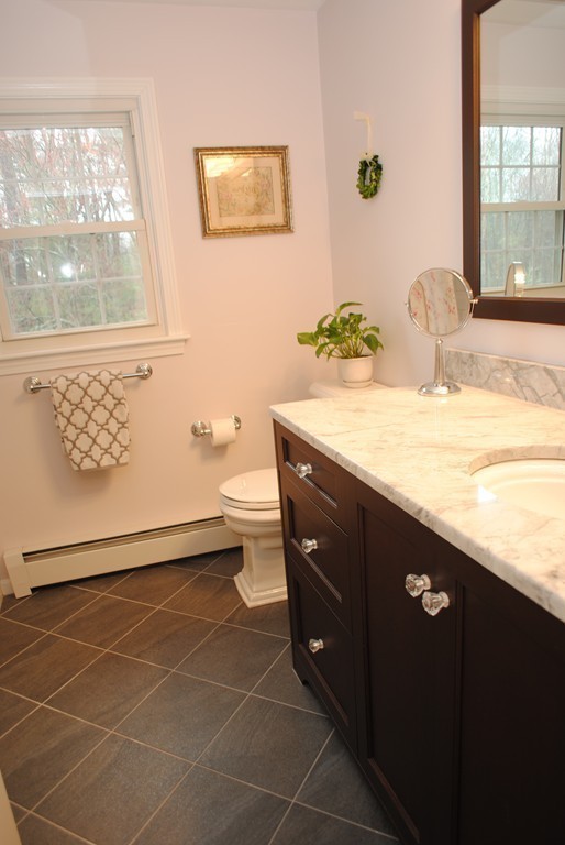 61 Blanchard Road Boxborough, MA 01719 - Photo 21 of 27 a bathroom with a sink a vanity and a mirror