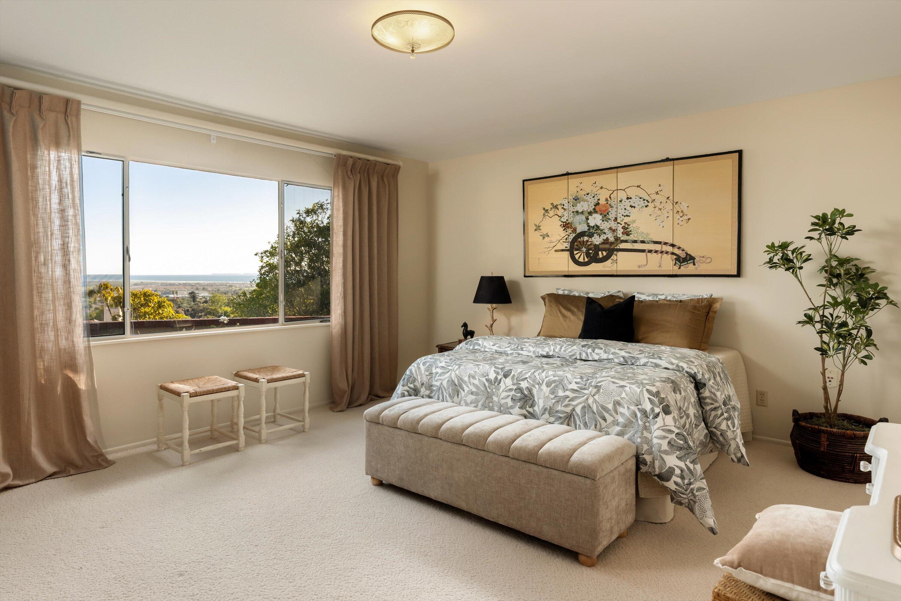 3940 Foothill Road Ventura, CA 93003 - Photo 19 of 49 a bedroom with furniture and window