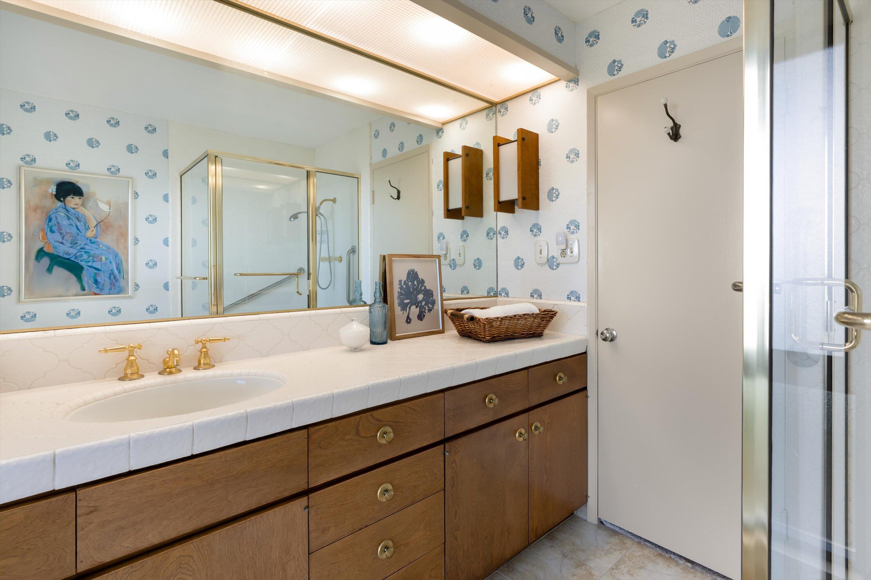 3940 Foothill Road Ventura, CA 93003 - Photo 21 of 49 a bathroom with a sink and a mirror