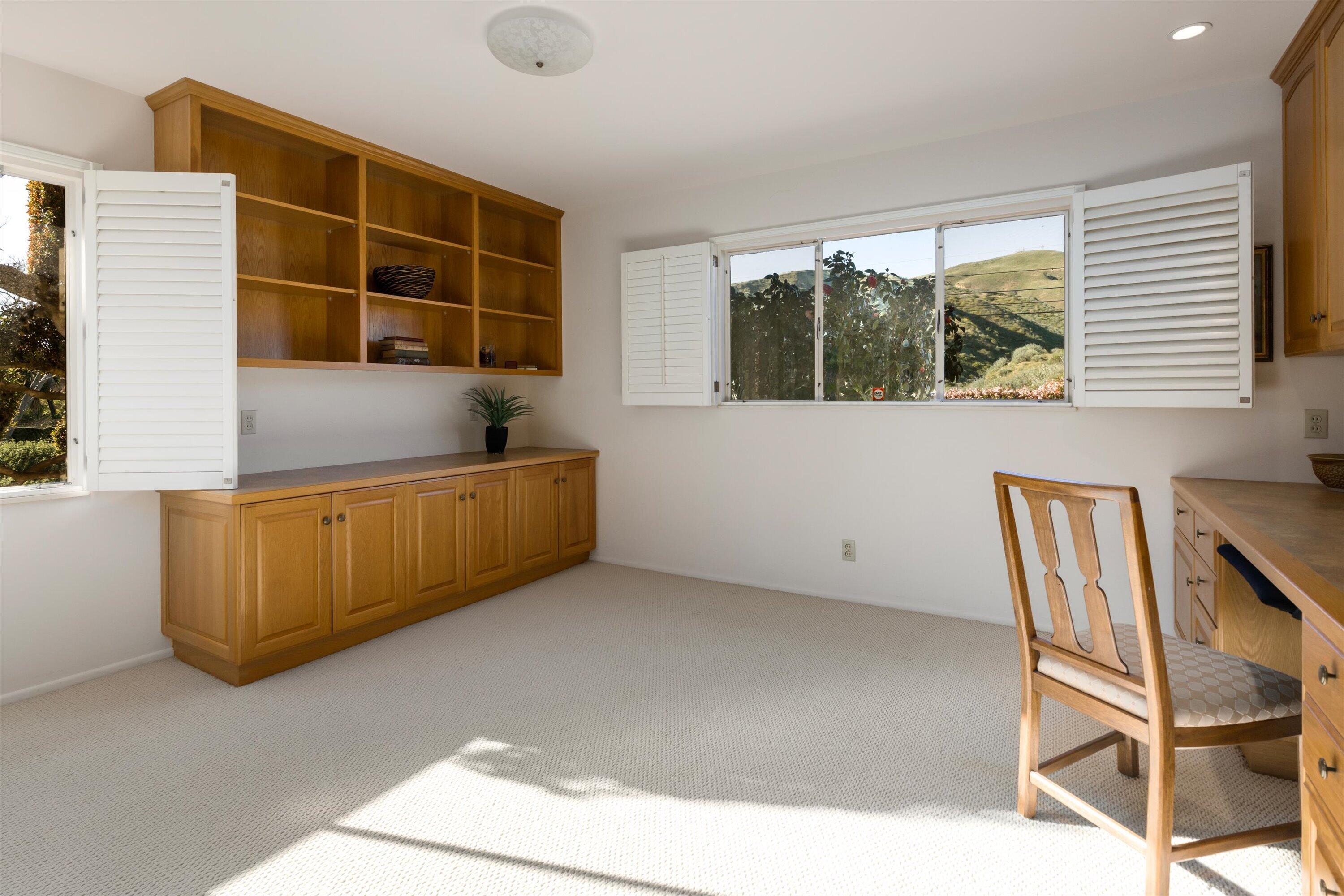 3940 Foothill Road Ventura, CA 93003 - Photo 24 of 49 a living room with a couch and a window