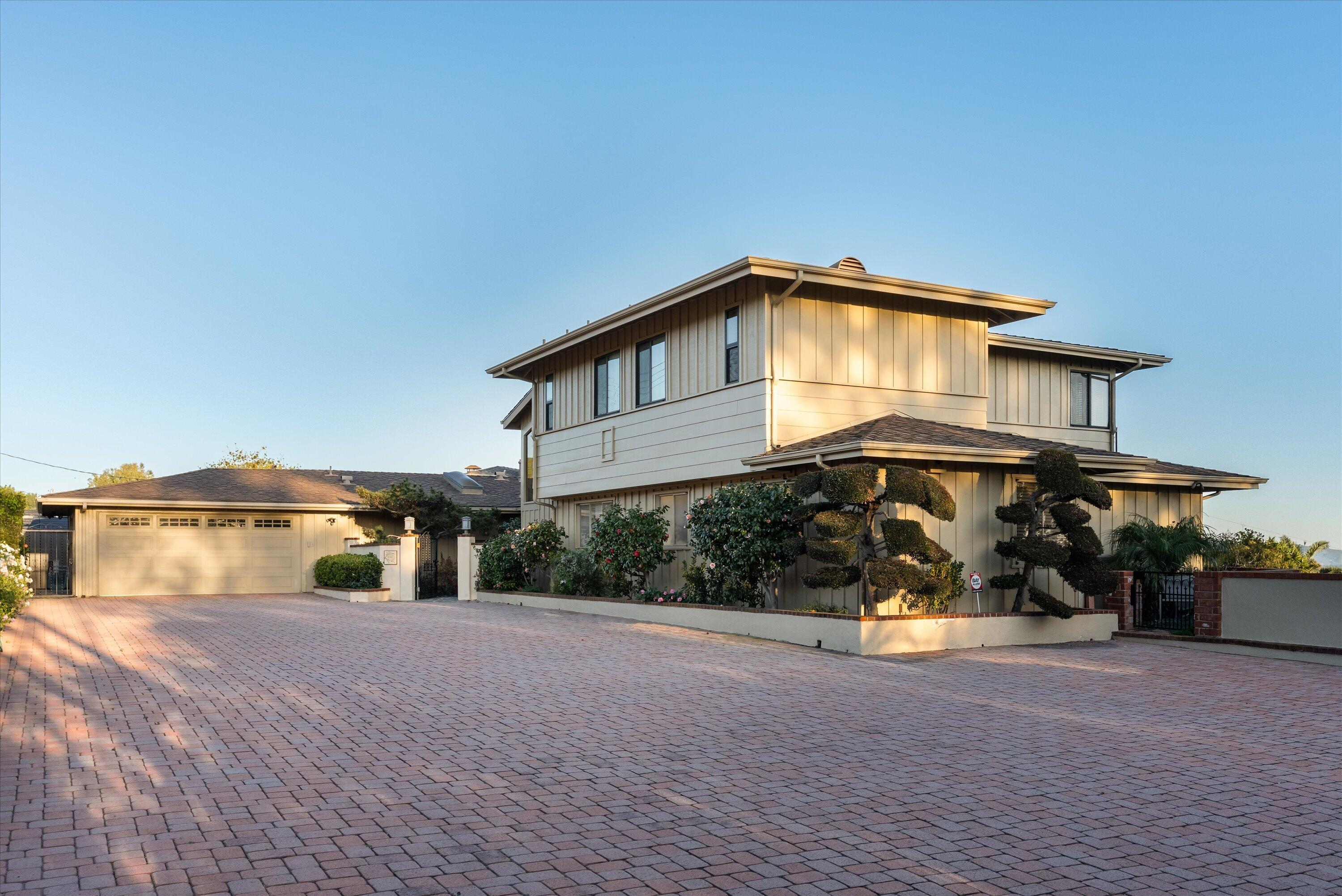 3940 Foothill Road Ventura, CA 93003 - Photo 3 of 49 a front view of a house with a yard