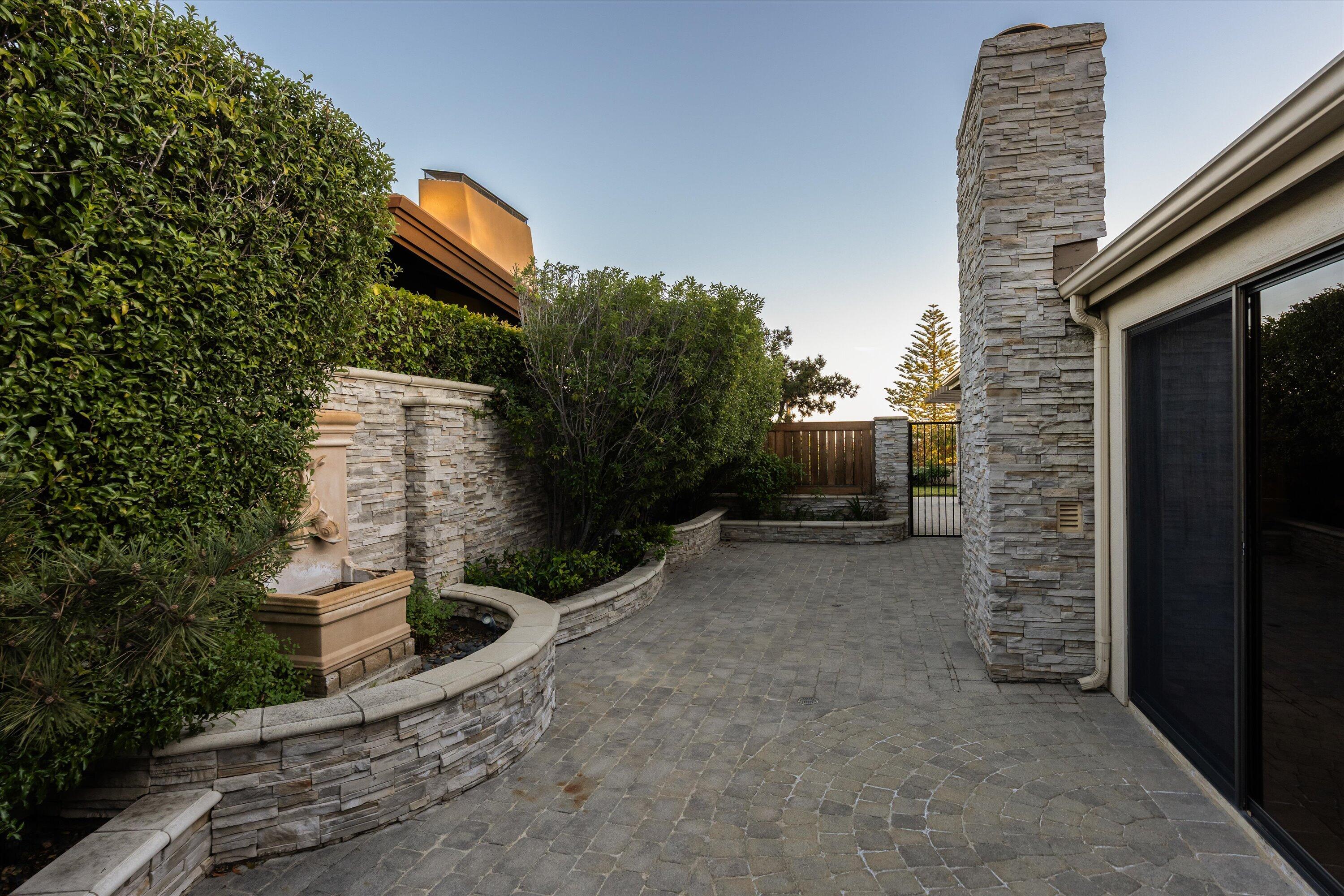 3940 Foothill Road Ventura, CA 93003 - Photo 32 of 49 a backyard of a house with lots of green space
