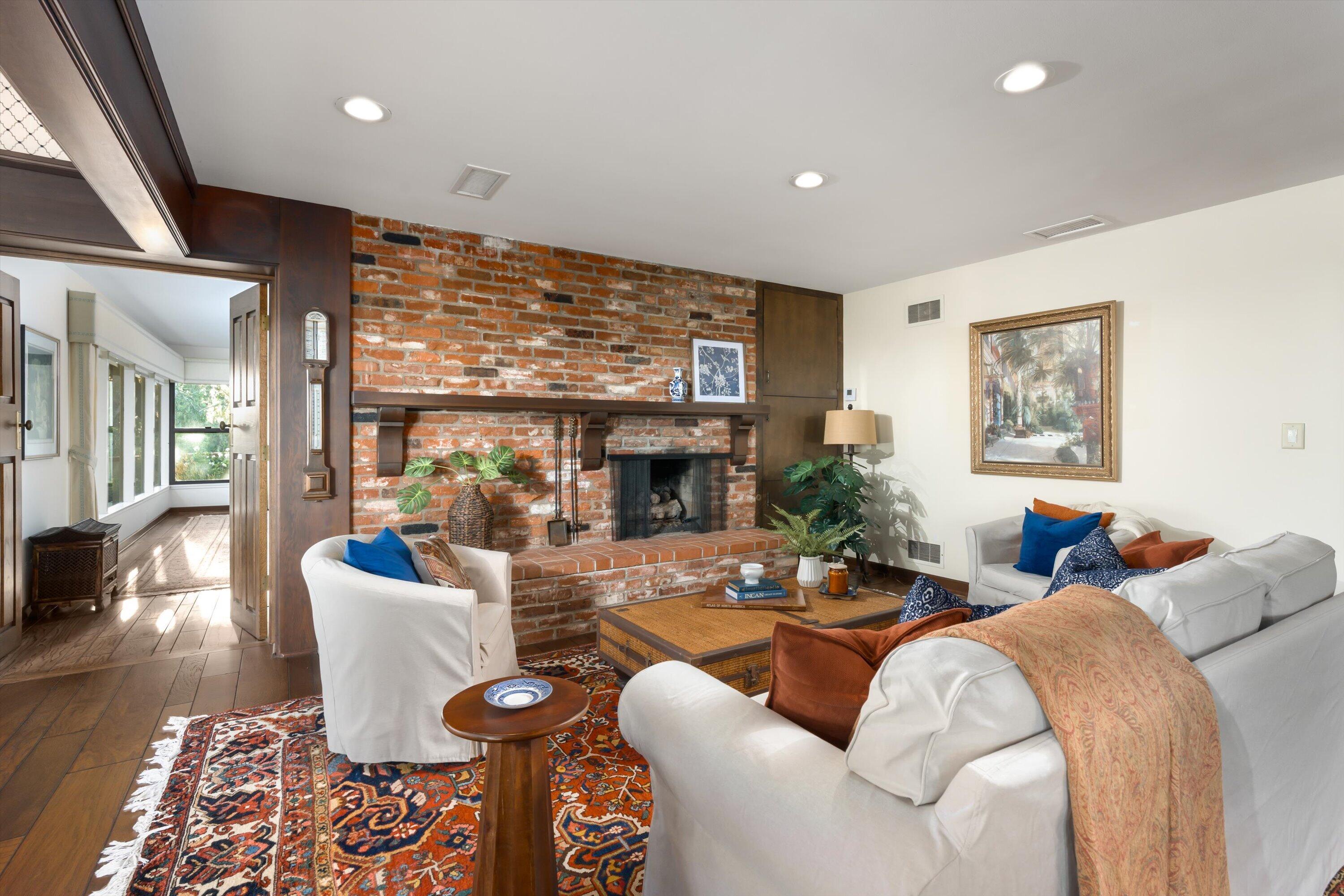 3940 Foothill Road Ventura, CA 93003 - Photo 10 of 49 a living room with fireplace furniture and a large window