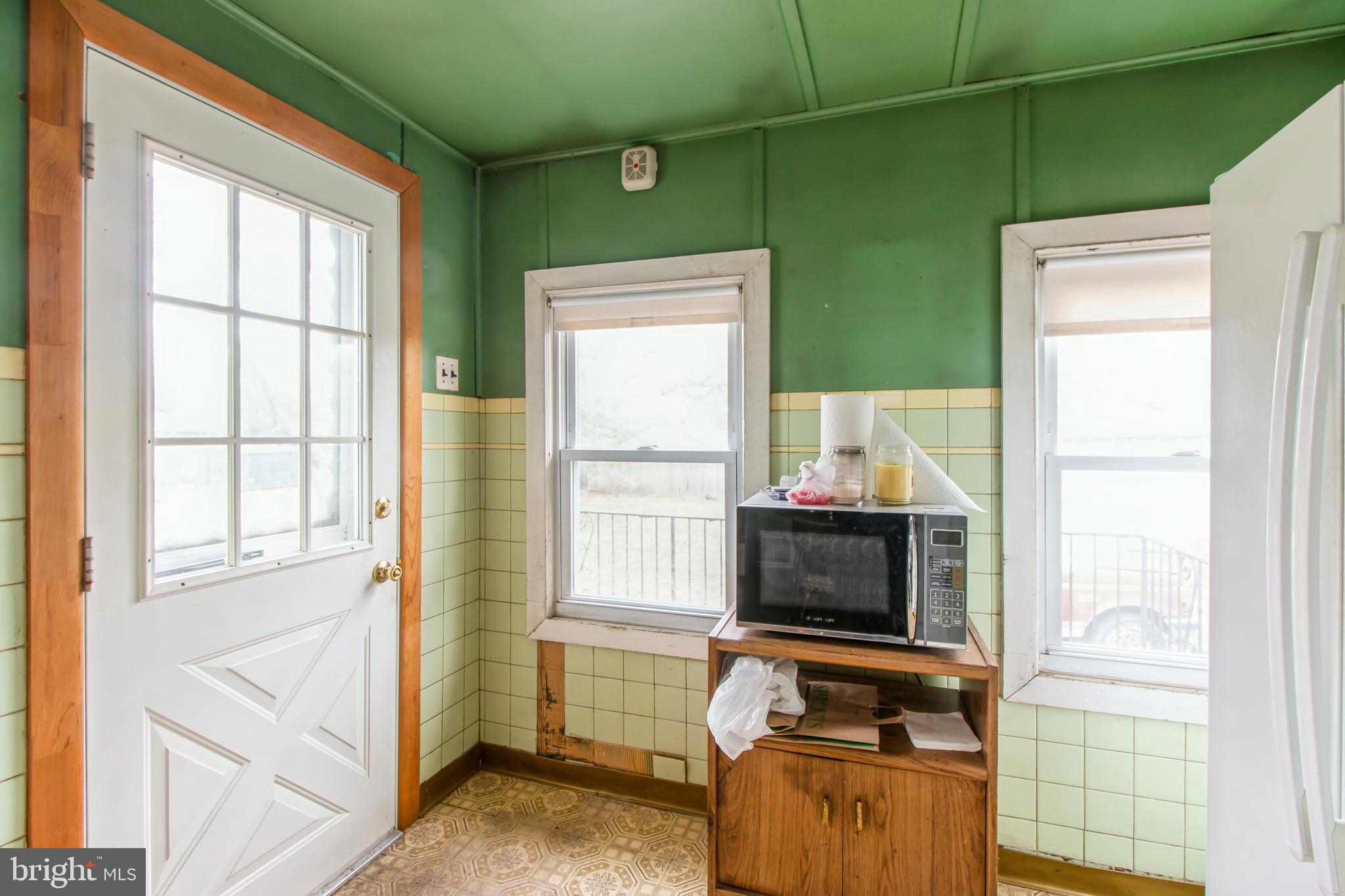 606 Highland Avenue Palmyra, NJ 08065 - Photo 12 of 25 a living room with furniture and a flat screen tv