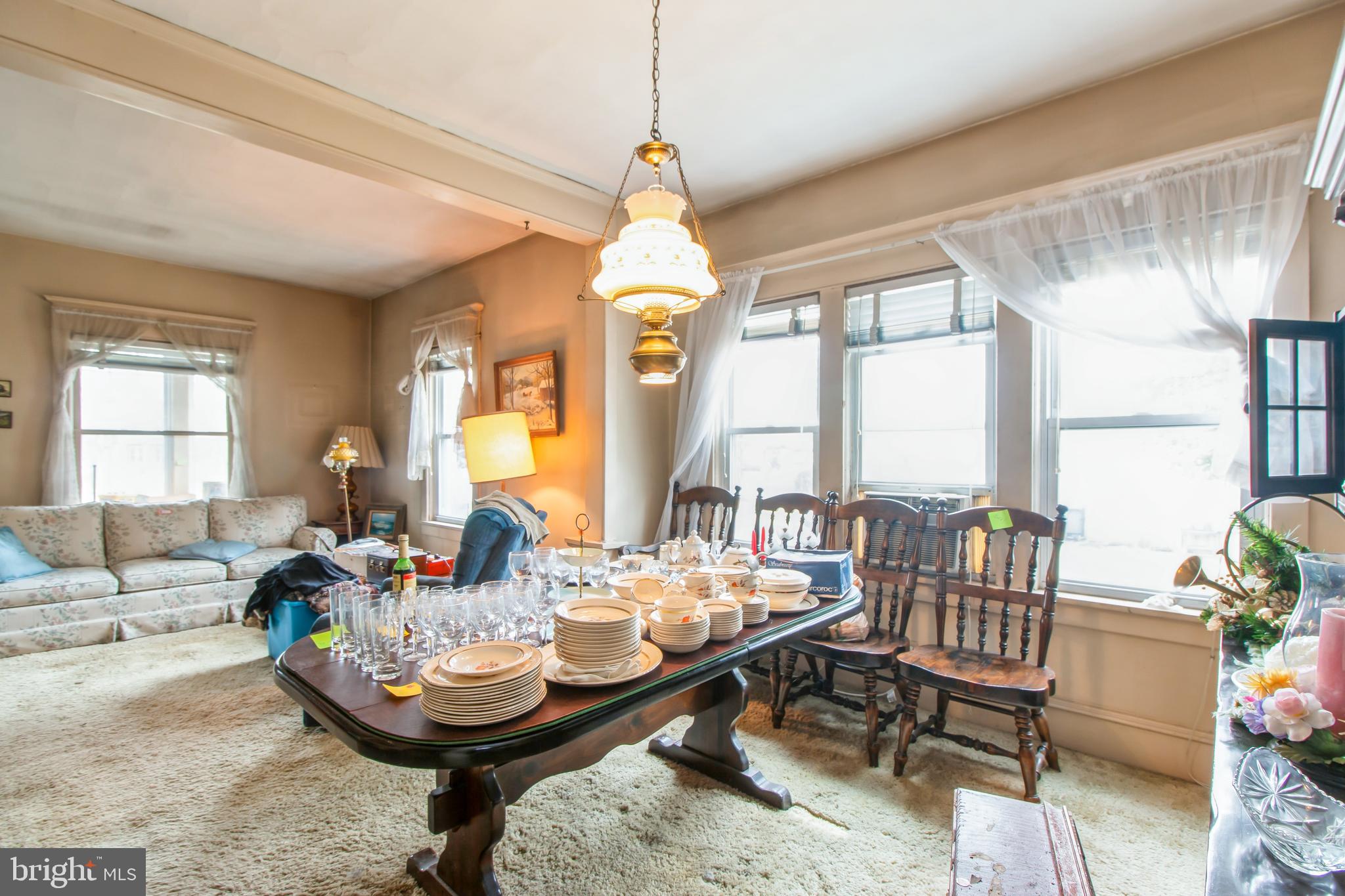 606 Highland Avenue Palmyra, NJ 08065 - Photo 10 of 25 a living room with furniture and a large window