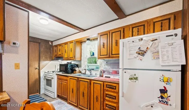 a view of a bedroom with bathroom