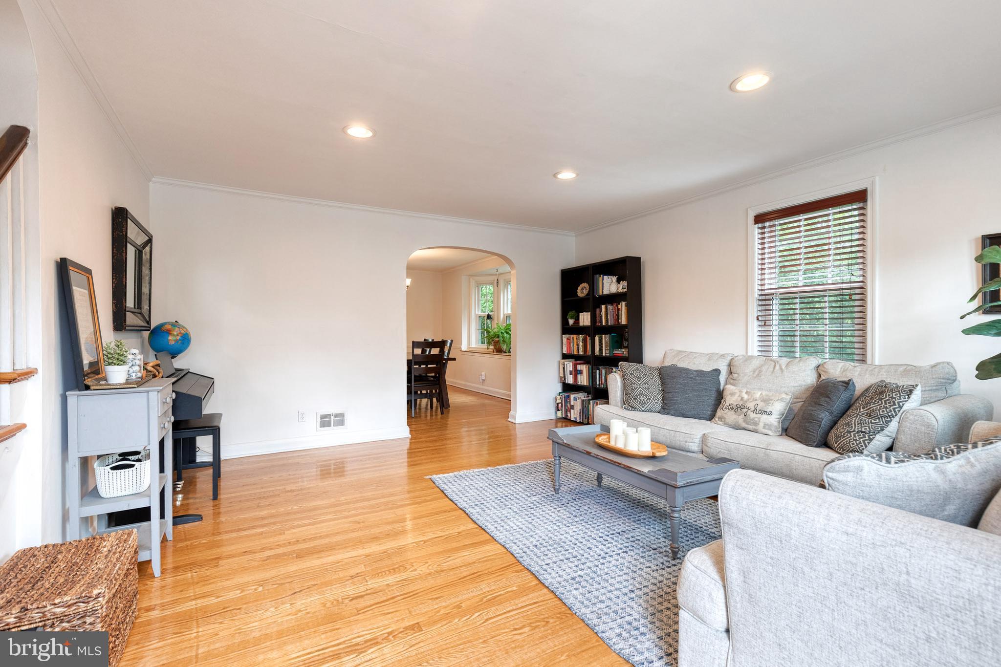203 Stanmore Road Baltimore, MD 21212 - Photo 4 of 38 a living room with furniture and a wooden floor