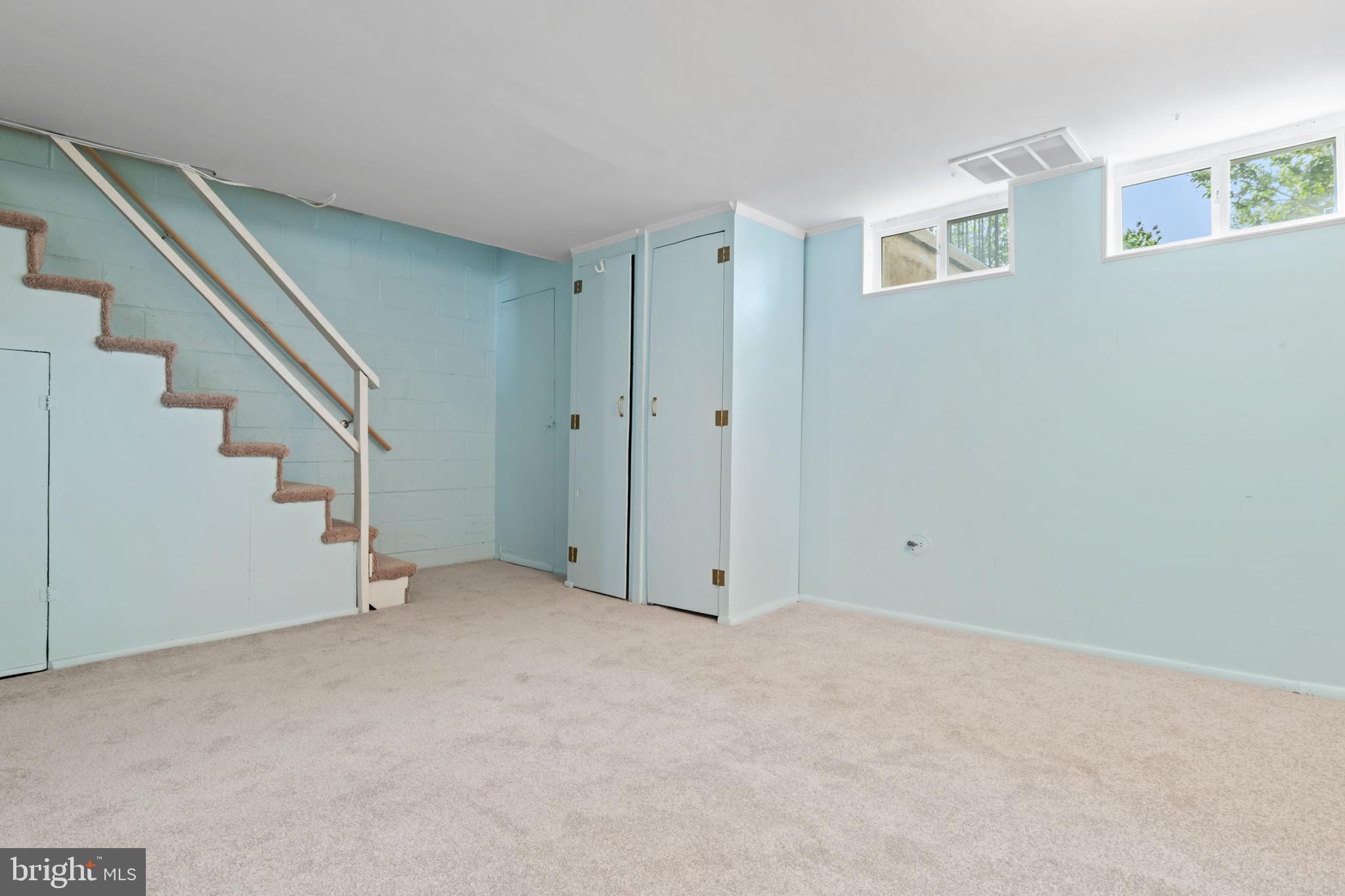 1616 Hardwick Road Towson, MD 21286 - Photo 13 of 53 a view of an empty room with stairs