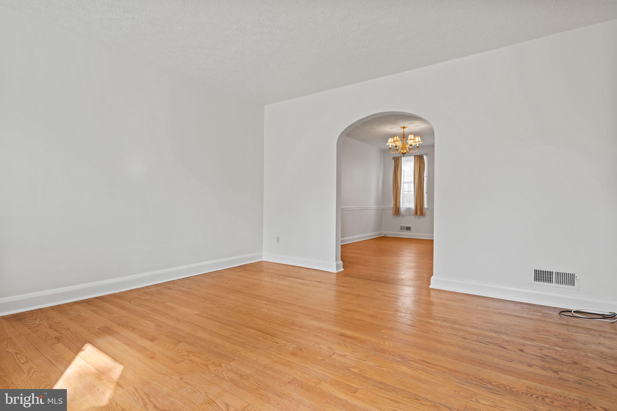 1616 Hardwick Road Towson, MD 21286 - Photo 16 of 53 a view of empty room with wooden floor and fan