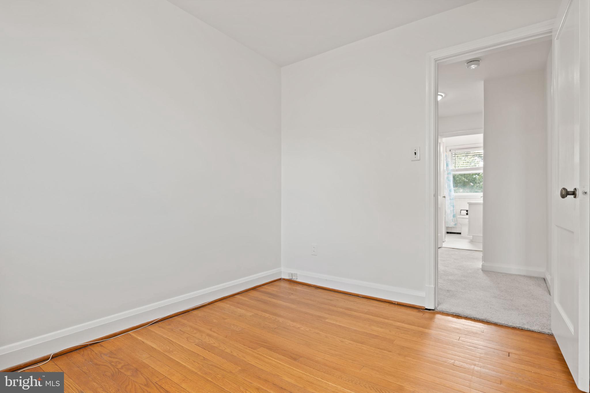 1616 Hardwick Road Towson, MD 21286 - Photo 32 of 53 wooden floor in an empty room