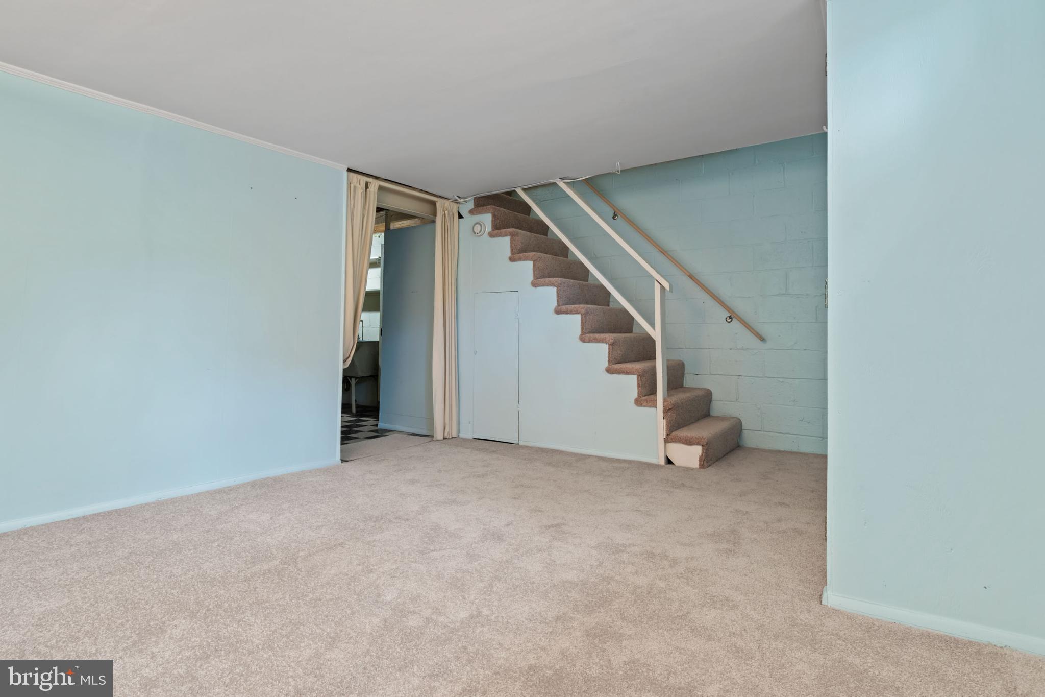 1616 Hardwick Road Towson, MD 21286 - Photo 34 of 53 a view of an empty room with stairs