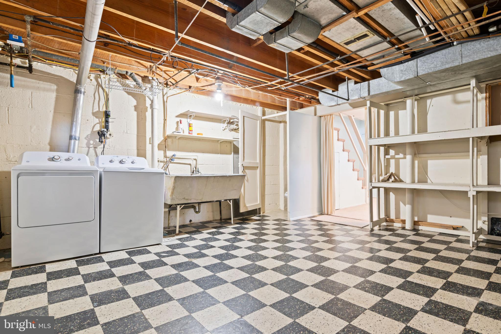 1616 Hardwick Road Towson, MD 21286 - Photo 36 of 53 a black and white checkered floor with a black white checkered floor