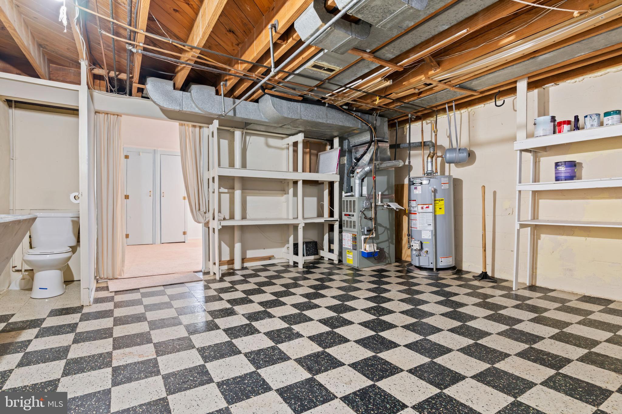 1616 Hardwick Road Towson, MD 21286 - Photo 39 of 53 a black and white checkered floor