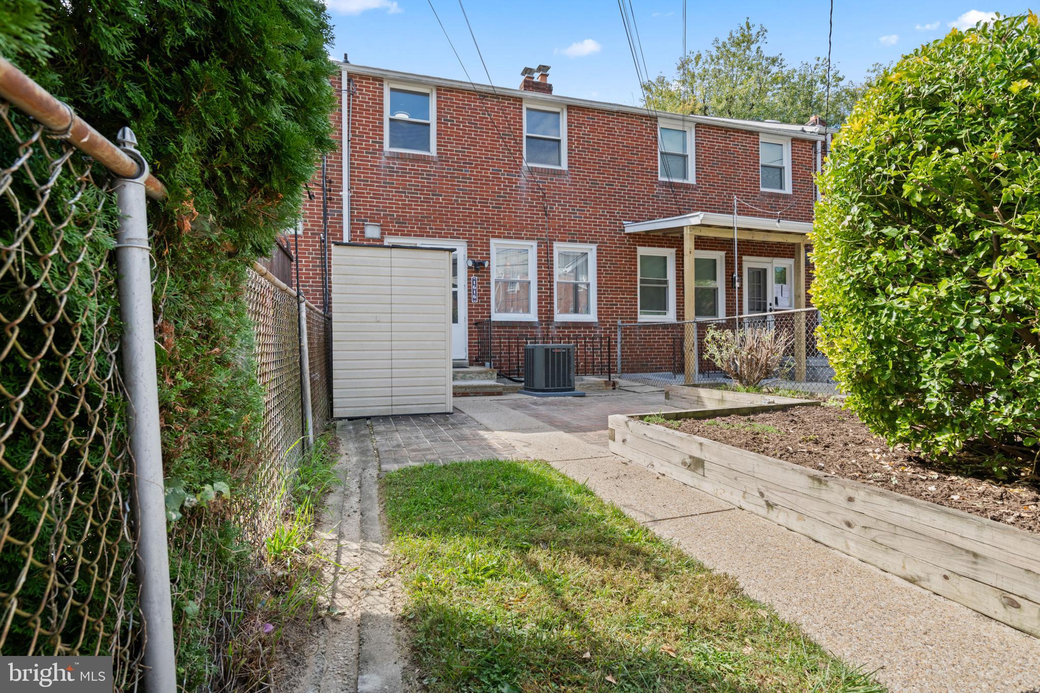 1616 Hardwick Road Towson, MD 21286 - Photo 43 of 53 front view of a house with a yard